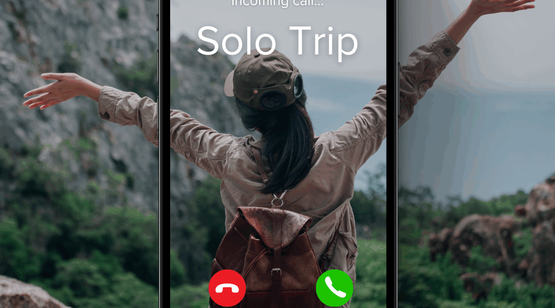 A woman sits on a rock facing a scenic mountain landscape with her arms raised joyfully. Overlaid on the image is a smartphone screen showing an incoming call from "Solo Trip," with options to decline or accept. She wears a green cap, long-sleeve shirt, and a brown backpack, symbolizing the excitement of solo travel and adventure.