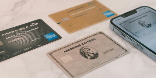 the boujee duck American Express credit cards on marble surface