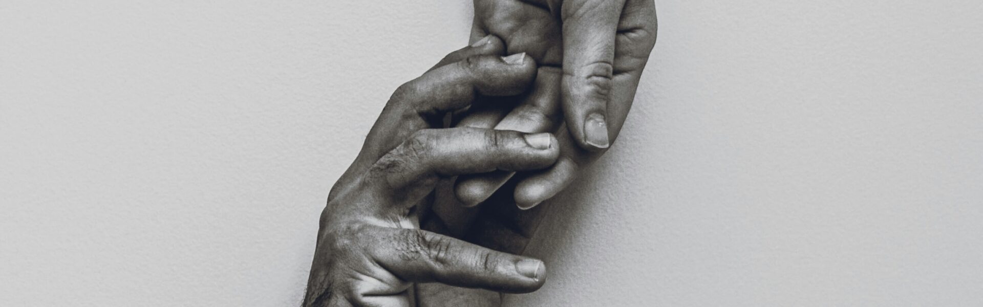 Caregiving Connection - the boujee duck the boujee duck Two hands reaching toward each other in black and white